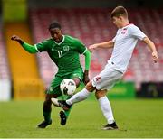 13 October 2021; Franco Umeh of Republic of Ireland in action against Bartosz Bernatowicz of Poland during the UEFA U17 Championship Qualifying Round Group 5 match between Republic of Ireland and Poland at Turner's Cross in Cork. Photo by Eóin Noonan/Sportsfile