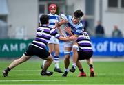 13 October 2021; Donie Grehan of Blackrock College is tackled by Ólan Storey, left, and Donnchadh Cullinan of Terenure College during the Bank of Ireland Leinster Schools Junior Cup semi-final match between Blackrock College and Terenure College at Energia Park in Dublin. Photo by Piaras Ó Mídheach/Sportsfile