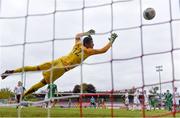 13 October 2021; Justin Ferizaj of Republic of Ireland shoots to score his side's second goal despite the efforts of Poland goalkeeper Marcel Mendes-Dudzinski during the UEFA U17 Championship Qualifying Round Group 5 match between Republic of Ireland and Poland at Turner's Cross in Cork. Photo by Eóin Noonan/Sportsfile