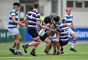 13 October 2021; Donie Grehan of Blackrock College is tackled by Ólan Storey, left, and Donnchadh Cullinan of Terenure College during the Bank of Ireland Leinster Schools Junior Cup semi-final match between Blackrock College and Terenure College at Energia Park in Dublin. Photo by Piaras Ó Mídheach/Sportsfile