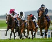 14 October 2021; Anner Castle, with Shane Foley up, right, lead eventual second placed Seattle Creek, with Chris Hayes up, on their way to winning the Hollywoodbets Now Streaming All Irish Racing Maiden at The Curragh Racecourse in Kildare. Photo by Harry Murphy/Sportsfile