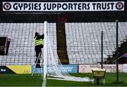 15 October 2021; Dalymount Park groundman Noel Cosgrove hangs the netting on the goalposts before the SSE Airtricity League Premier Division match between Bohemians and Dundalk at Dalymount Park in Dublin. Photo by Ben McShane/Sportsfile