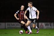 15 October 2021; Daniel Cleary of Dundalk in action against Georgie Kelly of Bohemians during the SSE Airtricity League Premier Division match between Bohemians and Dundalk at Dalymount Park in Dublin. Photo by Ben McShane/Sportsfile