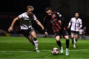 15 October 2021; Liam Burt of Bohemians in action against Greg Sloggett of Dundalk during the SSE Airtricity League Premier Division match between Bohemians and Dundalk at Dalymount Park in Dublin. Photo by Ben McShane/Sportsfile