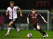 15 October 2021; Ross Tierney of Bohemians in action against Greg Sloggett of Dundalk during the SSE Airtricity League Premier Division match between Bohemians and Dundalk at Dalymount Park in Dublin. Photo by Ben McShane/Sportsfile