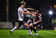 15 October 2021; Liam Burt of Bohemians in action against Greg Sloggett of Dundalk during the SSE Airtricity League Premier Division match between Bohemians and Dundalk at Dalymount Park in Dublin. Photo by Ben McShane/Sportsfile