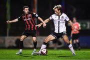 15 October 2021; Greg Sloggett of Dundalk in action against Liam Burt of Bohemians during the SSE Airtricity League Premier Division match between Bohemians and Dundalk at Dalymount Park in Dublin. Photo by Ben McShane/Sportsfile