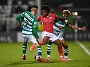 15 October 2021; Walter Figueira of Sligo Rovers in action against Dylan Watts, left, and Barry Cotter of Shamrock Rovers during the SSE Airtricity League Premier Division match between Shamrock Rovers and Sligo Rovers at Tallaght Stadium in Dublin. Photo by Seb Daly/Sportsfile