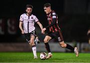 15 October 2021; Dawson Devoy of Bohemians in action against Sam Stanton of Dundalk during the SSE Airtricity League Premier Division match between Bohemians and Dundalk at Dalymount Park in Dublin. Photo by Ben McShane/Sportsfile