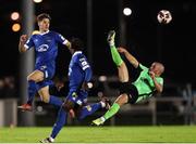 15 October 2021; Mark Coyle of Finn Harps in action against John Martin, and Junior Quitirna of Waterford  during the SSE Airtricity League Premier Division match between Waterford and Finn Harps at the RSC in Waterford. Photo by Michael P Ryan/Sportsfile