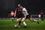 15 October 2021; Michael Duffy of Dundalk in action against Andy Lyons of Bohemians during the SSE Airtricity League Premier Division match between Bohemians and Dundalk at Dalymount Park in Dublin. Photo by Ben McShane/Sportsfile