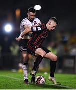 15 October 2021; Michael Duffy of Dundalk in action against Andy Lyons of Bohemians during the SSE Airtricity League Premier Division match between Bohemians and Dundalk at Dalymount Park in Dublin. Photo by Ben McShane/Sportsfile