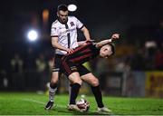 15 October 2021; Michael Duffy of Dundalk in action against Andy Lyons of Bohemians during the SSE Airtricity League Premier Division match between Bohemians and Dundalk at Dalymount Park in Dublin. Photo by Ben McShane/Sportsfile