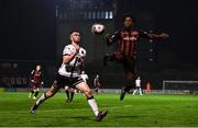 15 October 2021; Michael Duffy of Dundalk in action against Promise Omochere of Bohemians during the SSE Airtricity League Premier Division match between Bohemians and Dundalk at Dalymount Park in Dublin. Photo by Ben McShane/Sportsfile