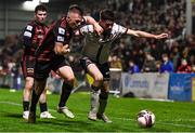 15 October 2021; Sam Stanton of Dundalk in action against Andy Lyons of Bohemians during the SSE Airtricity League Premier Division match between Bohemians and Dundalk at Dalymount Park in Dublin. Photo by Ben McShane/Sportsfile