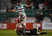 15 October 2021; Neil Farrugia of Shamrock Rovers in action against Sligo Rovers goalkeeper Ed McGinty during the SSE Airtricity League Premier Division match between Shamrock Rovers and Sligo Rovers at Tallaght Stadium in Dublin. Photo by Seb Daly/Sportsfile