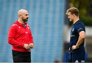 16 October 2021; Scarlets defence coach Hugh Hogan, left, in conversation with Josh van der Flier of Leinster before the United Rugby Championship match between Leinster and Scarlets at the RDS Arena in Dublin. Photo by Seb Daly/Sportsfile
