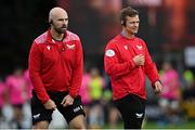 16 October 2021; Scarlets defence coach Hugh Hogan, left, and Scarlets head coach Dwayne Peel before the United Rugby Championship match between Leinster and Scarlets at the RDS Arena in Dublin. Photo by Ramsey Cardy/Sportsfile