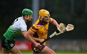 16 October 2021; Darren Kelly of Craobh Chiaráin in action against Paul Rigney of Lucan Sarsfields during the Go Ahead Dublin County Senior Club Hurling Championship quarter-final match between Craobh Chiaráin and Lucan Sarsfields at Parnell Park in Dublin. Photo by Eóin Noonan/Sportsfile