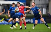 16 October 2021; Ryan Conbeer of Scarlets is tackled by Garry Ringrose and Ciarán Frawley of Leinster during the United Rugby Championship match between Leinster and Scarlets at the RDS Arena in Dublin. Photo by Harry Murphy/Sportsfile