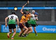 16 October 2021; John Bellew of Lucan Sarsfields is tackled by James Finn, left, and Cian Derwin of Craobh Chiaráin during the Go Ahead Dublin County Senior Club Hurling Championship quarter-final match between Craobh Chiaráin and Lucan Sarsfields at Parnell Park in Dublin. Photo by Eóin Noonan/Sportsfile