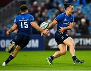 16 October 2021; James Lowe of Leinster off-loads to team-mate Hugo Keenan during the United Rugby Championship match between Leinster and Scarlets at the RDS Arena in Dublin. Photo by Seb Daly/Sportsfile