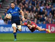 16 October 2021; Jack Conan of Leinster is tackled by Tom Rogers of Scarlets during the United Rugby Championship match between Leinster and Scarlets at the RDS Arena in Dublin. Photo by Harry Murphy/Sportsfile
