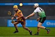16 October 2021; Stephen Kelly of Craobh Chiaráin in action against Peter Kelly of Lucan Sarsfields during the Go Ahead Dublin County Senior Club Hurling Championship quarter-final match between Craobh Chiaráin and Lucan Sarsfields at Parnell Park in Dublin. Photo by Eóin Noonan/Sportsfile