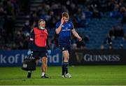 16 October 2021; Ciarán Frawley of Leinster leaves the field with head of medical Professor John Ryan following an injury during the United Rugby Championship match between Leinster and Scarlets at the RDS Arena in Dublin. Photo by Seb Daly/Sportsfile