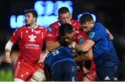 16 October 2021; Sam Lousi of Scarlets is tackled by Jamison Gibson-Park, left, and Jack Conan of Leinster during the United Rugby Championship match between Leinster and Scarlets at the RDS Arena in Dublin. Photo by Ramsey Cardy/Sportsfile