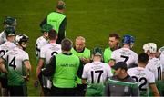 16 October 2021; Lucan Sarsfields manager Sean McCaffrey speaking to his players at half time during the Go Ahead Dublin County Senior Club Hurling Championship quarter-final match between Craobh Chiaráin and Lucan Sarsfields at Parnell Park in Dublin. Photo by Eóin Noonan/Sportsfile