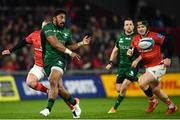16 October 2021; Bundee Aki of Connacht offloads the ball during the United Rugby Championship match between Munster and Connacht at Thomond Park in Limerick. Photo by David Fitzgerald/Sportsfile