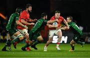 16 October 2021; Rory Scannell of Munster is tackled by Matthew Burke, left, and Jack Carty of Connacht during the United Rugby Championship match between Munster and Connacht at Thomond Park in Limerick. Photo by Piaras Ó Mídheach/Sportsfile
