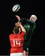 16 October 2021; Mack Hansen of Connacht in action against Andrew Conway of Munster during the United Rugby Championship match between Munster and Connacht at Thomond Park in Limerick. Photo by David Fitzgerald/Sportsfile
