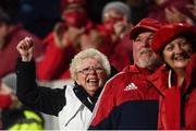 16 October 2021; Munster supporters celebrate their side's first try, scored by Chris Cloete, during the United Rugby Championship match between Munster and Connacht at Thomond Park in Limerick. Photo by David Fitzgerald/Sportsfile