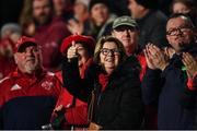 16 October 2021; Munster supporters celebrate their side's first try, scored by Chris Cloete, during the United Rugby Championship match between Munster and Connacht at Thomond Park in Limerick. Photo by David Fitzgerald/Sportsfile