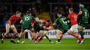 16 October 2021; Andrew Conway of Munster is tackled by Mack Hansen of Connacht during the United Rugby Championship match between Munster and Connacht at Thomond Park in Limerick. Photo by Piaras Ó Mídheach/Sportsfile