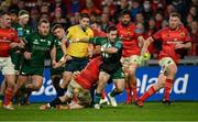 16 October 2021; Caolin Blade of Connacht is tackled by Chris Cloete of Munster during the United Rugby Championship match between Munster and Connacht at Thomond Park in Limerick. Photo by Piaras Ó Mídheach/Sportsfile