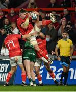 16 October 2021; Peter O'Mahony of Munster is tackled by Mack Hansen of Connacht during the United Rugby Championship match between Munster and Connacht at Thomond Park in Limerick. Photo by Piaras Ó Mídheach/Sportsfile