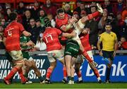 16 October 2021; Peter O'Mahony of Munster is tackled by Mack Hansen of Connacht during the United Rugby Championship match between Munster and Connacht at Thomond Park in Limerick. Photo by Piaras Ó Mídheach/Sportsfile