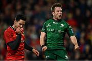 16 October 2021; Jack Carty of Connacht celebrates scoring his side's second try, as Joey Carbery of Munster looks on, during the United Rugby Championship match between Munster and Connacht at Thomond Park in Limerick. Photo by Piaras Ó Mídheach/Sportsfile