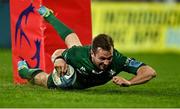 16 October 2021; Jack Carty of Connacht dives over to score his side's second try during the United Rugby Championship match between Munster and Connacht at Thomond Park in Limerick. Photo by Piaras Ó Mídheach/Sportsfile