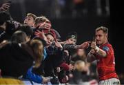 16 October 2021; Craig Casey of Munster with supporters after the United Rugby Championship match between Munster and Connacht at Thomond Park in Limerick. Photo by David Fitzgerald/Sportsfile