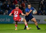 16 October 2021; James Lowe of Leinster in action against Tom Rogers of Scarlets during the United Rugby Championship match between Leinster and Scarlets at the RDS Arena in Dublin. Photo by Seb Daly/Sportsfile