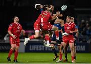 16 October 2021; Hugo Keenan of Leinster in action against Gareth Davies and Ryan Conbeer of Scarlets during the United Rugby Championship match between Leinster and Scarlets at the RDS Arena in Dublin. Photo by Seb Daly/Sportsfile
