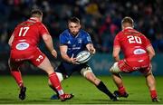 16 October 2021; Jack Conan of Leinster in action against Rob Evans, left, and Shaun Evans of Scarlets during the United Rugby Championship match between Leinster and Scarlets at the RDS Arena in Dublin. Photo by Seb Daly/Sportsfile