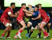 16 October 2021; Jack Conan of Leinster is tackled by Kieran Hardy, left, and Ryan Elias of Scarlets during the United Rugby Championship match between Leinster and Scarlets at the RDS Arena in Dublin. Photo by Seb Daly/Sportsfile