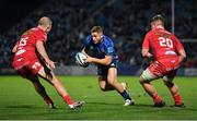 16 October 2021; Jordan Larmour of Leinster in action against Ioan Nicholas, left, and Shaun Evans of Scarlets during the United Rugby Championship match between Leinster and Scarlets at the RDS Arena in Dublin. Photo by Seb Daly/Sportsfile