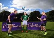 18 October 2021; Cadbury have been announced as an Official Partner of the Republic of Ireland Women’s National Football Team. To mark the launch, captain Katie McCabe is pictured with Jadine McDonnell and Chloe Croke Radley, right, visiting her old club, Raheny United FC whose senior women’s side will be the first of many grassroots women’s teams around Ireland to receive funding from Cadbury in a bid to boost participation among women. Photo by Stephen McCarthy/Sportsfile