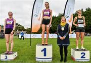 17 October 2021; On the podium after the Senior Women's 6000m are, first place Abbie Donnelly, second place Annmarie Mcglynn of Letterkenny AC, Donegal, and third place Kirsty Walker, with Brid Golden, Deputy President, Athletics Ireland, during the Autumn Open International Cross Country at the Sport Ireland Campus in Dublin. Photo by Sam Barnes/Sportsfile